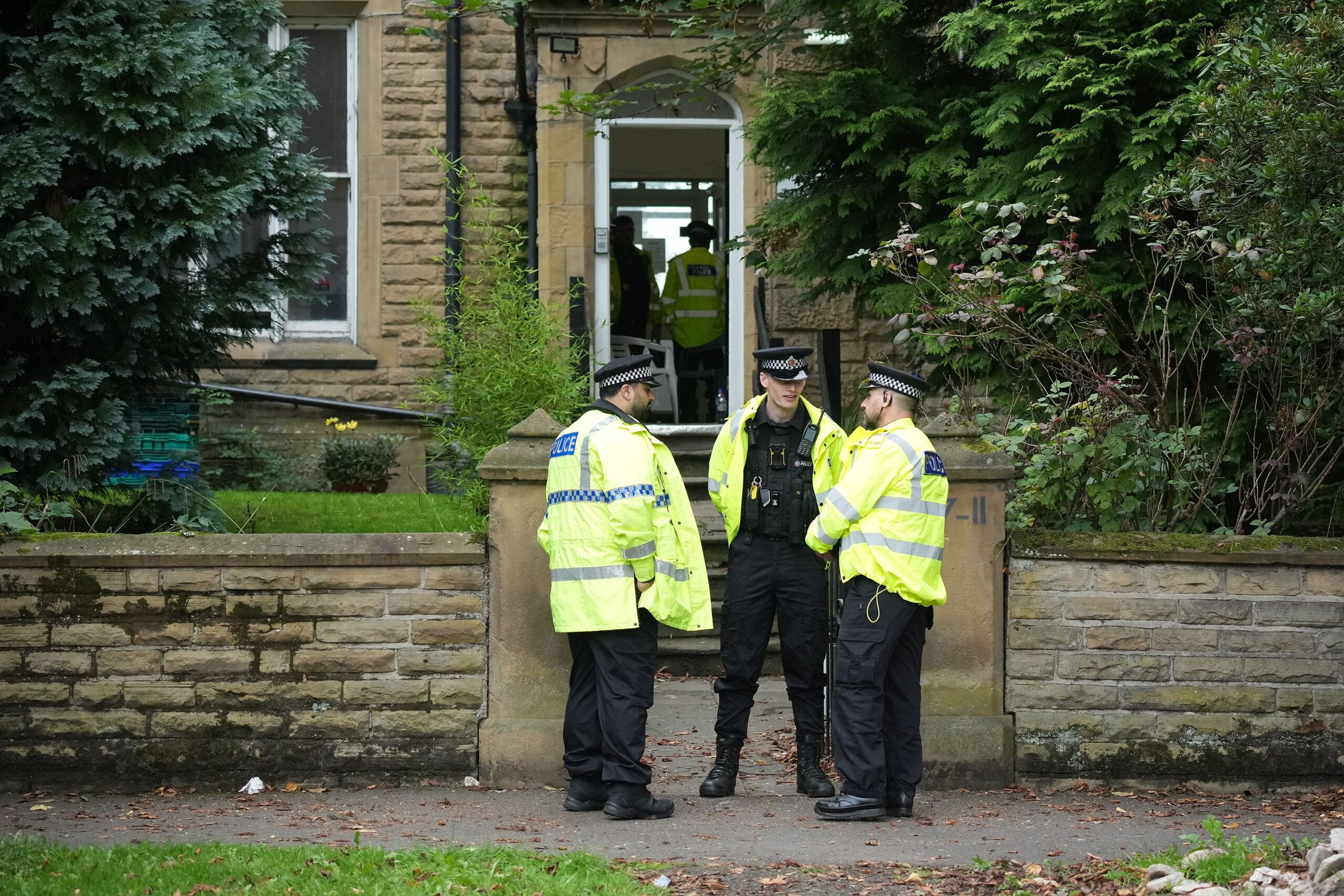 <i>Christopher Furlong/Getty Images via CNN Newsource</i><br/>Police attend an address in Manchester on September 21