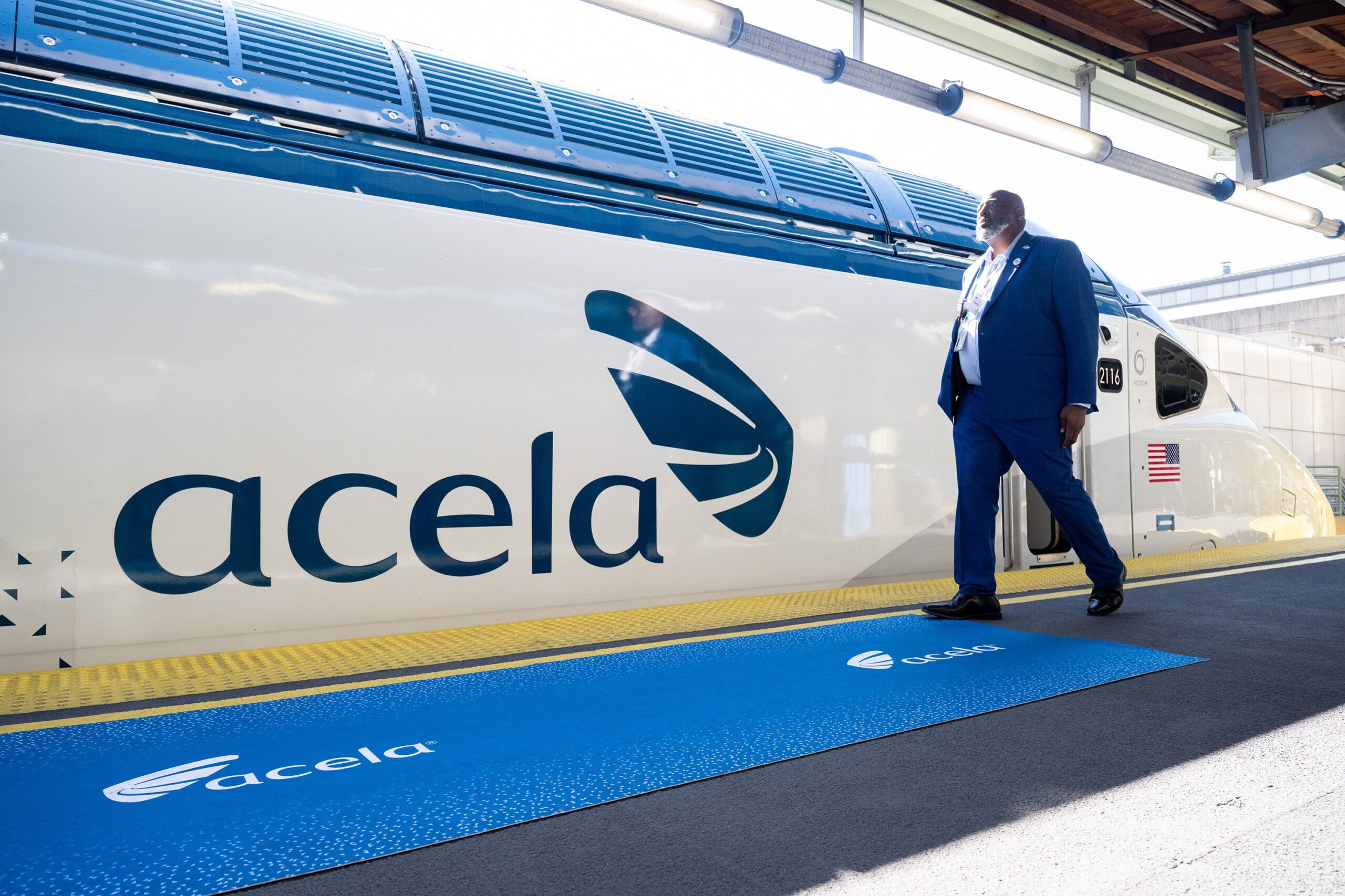 <i>Joe Raedle/Getty Images via CNN Newsource</i><br/>Passengers load up on the Brightline train at the Fort Lauderdale station during the inaugural trip from Miami to West Palm Beach in May 2018.