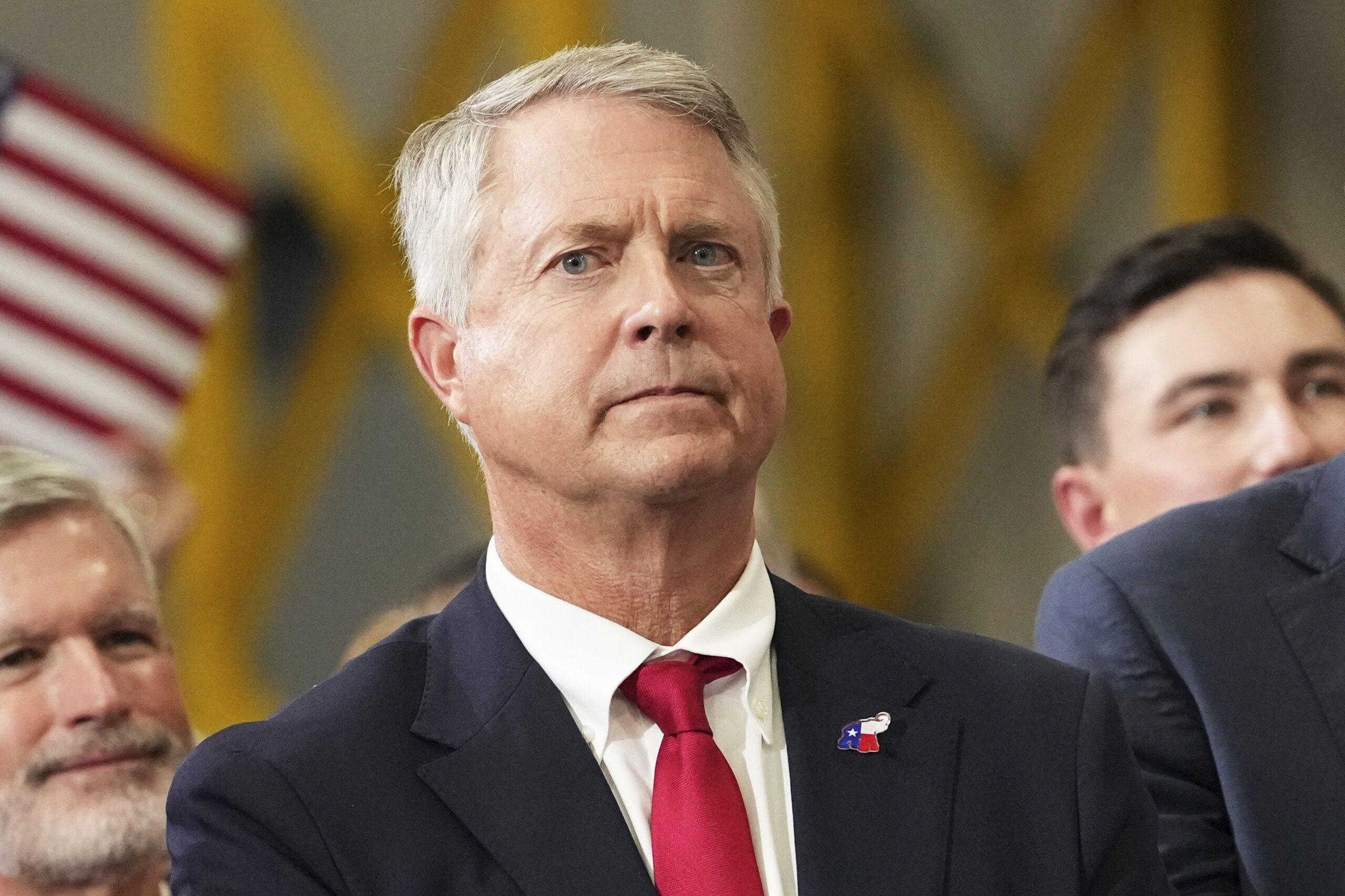 <i>Mark Schiefelbein/Pool/Getty Images via CNN Newsource</i><br/>Senator Roger Marshall listens as US Vice President JD Vance speaks during an event at Webco Manufacturing on September 14