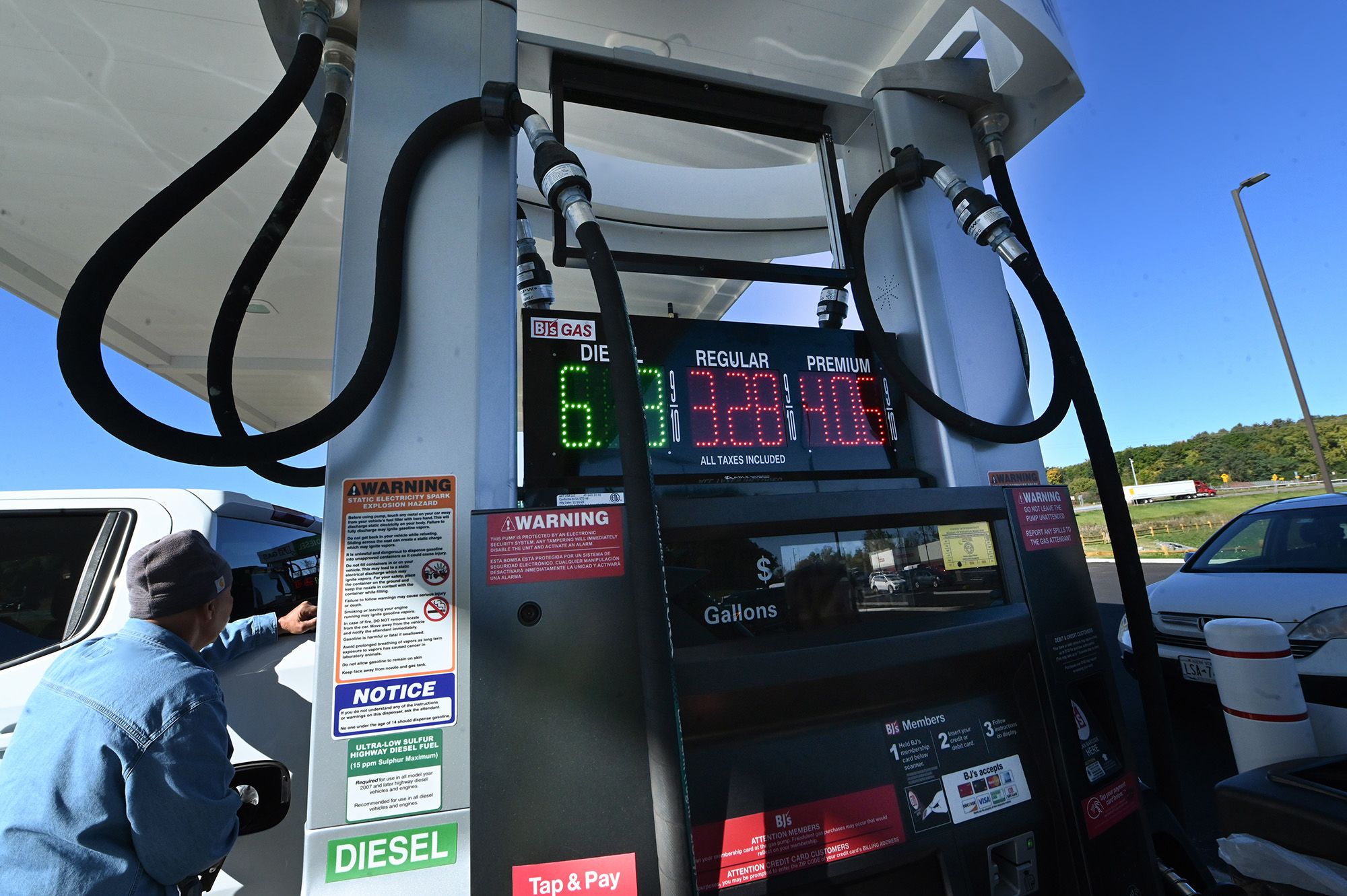 <i>Lori Van Buren/Albany Times Union/Getty Images via CNN Newsource</i><br/>David Rotundo of Blue Mountain Lake fills his pickup truck with gasoline on October 6