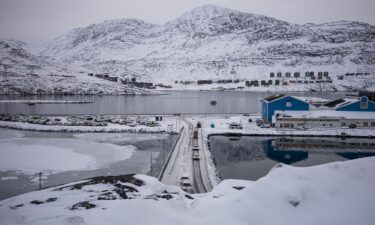 Vehicles on a narrow road in Nuuk