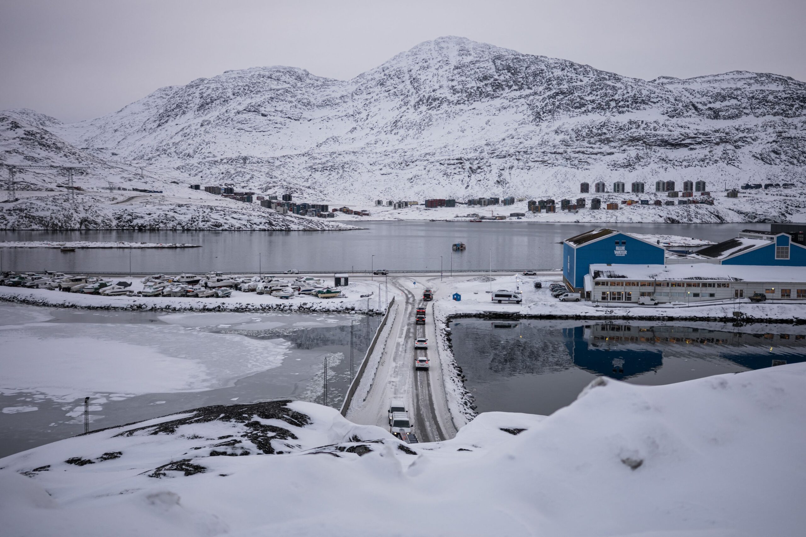 <i>Jonathan Nackstrand/AFP/Getty Images/File via CNN Newsource</i><br/>Vehicles on a narrow road in Nuuk