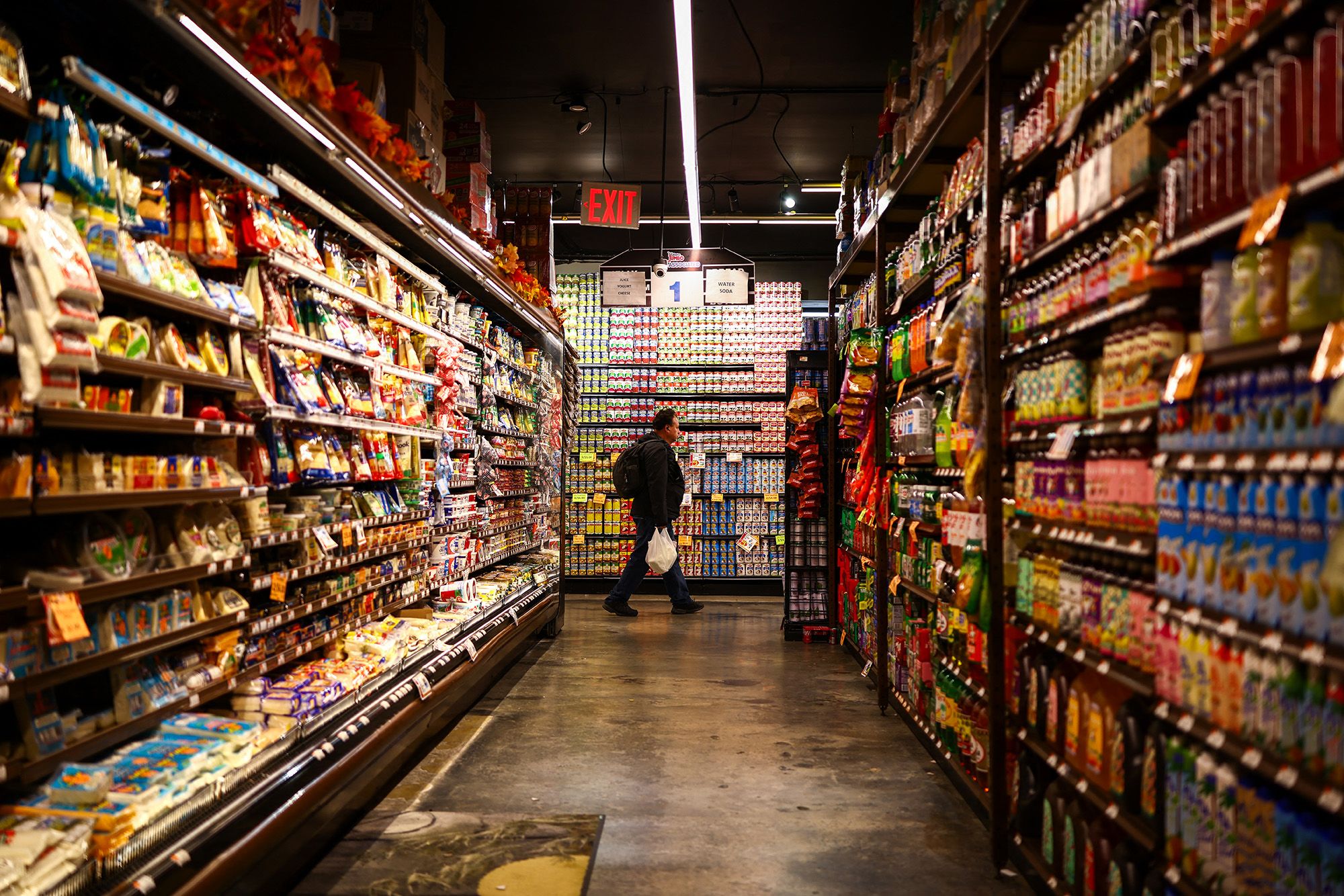 <i>Charly Triballeau/AFP/Getty Images via CNN Newsource</i><br/>A customer shops in a supermarket in the Sugar Hill neighborhood of Manhattan in New York on September 28.