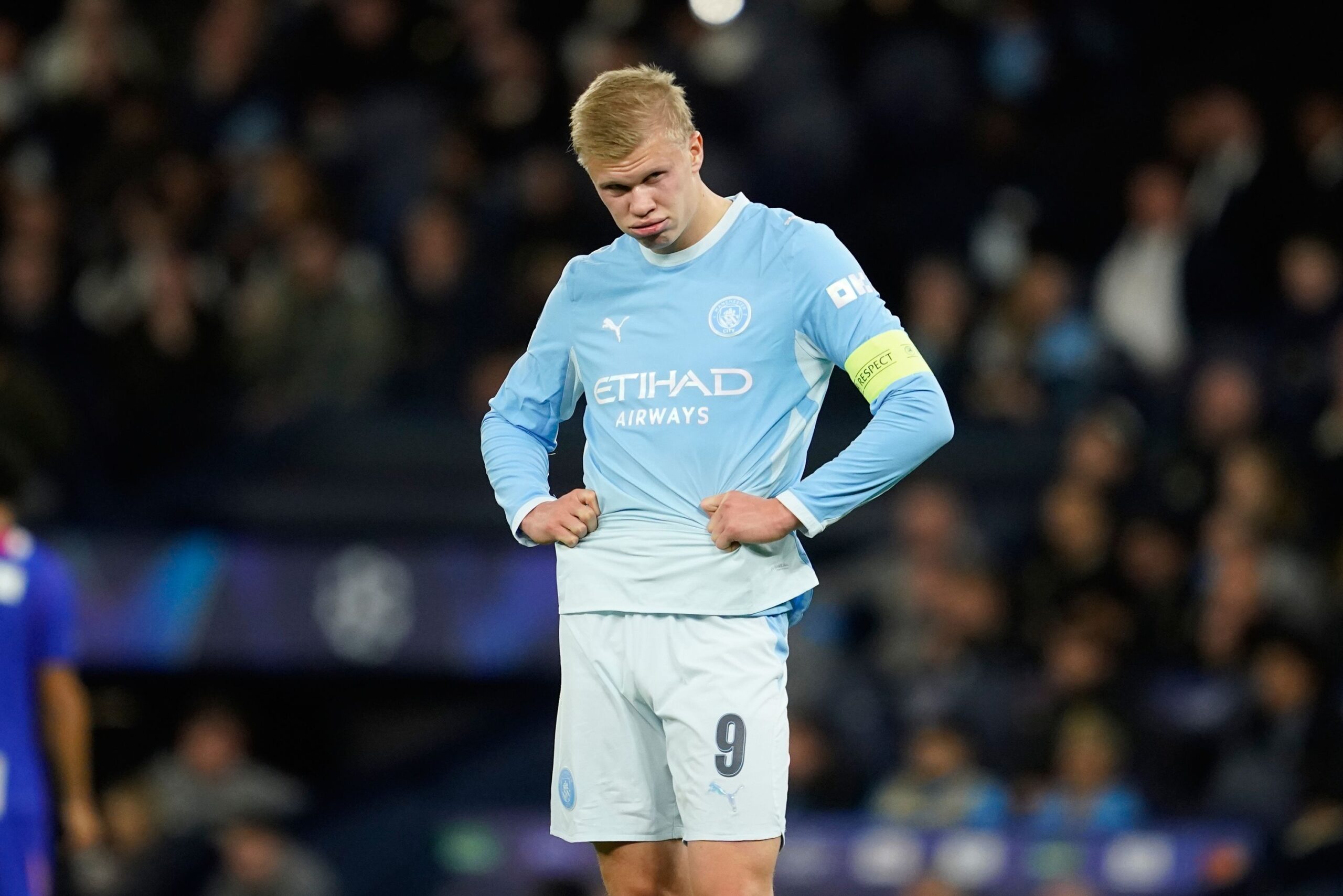 <i>Dave Thompson/AP via CNN Newsource</i><br/>Manchester City's Erling Haaland reacts after PSG's Maghnes Akliouche scores their fourth goal during the Champions League opening phase in Manchester