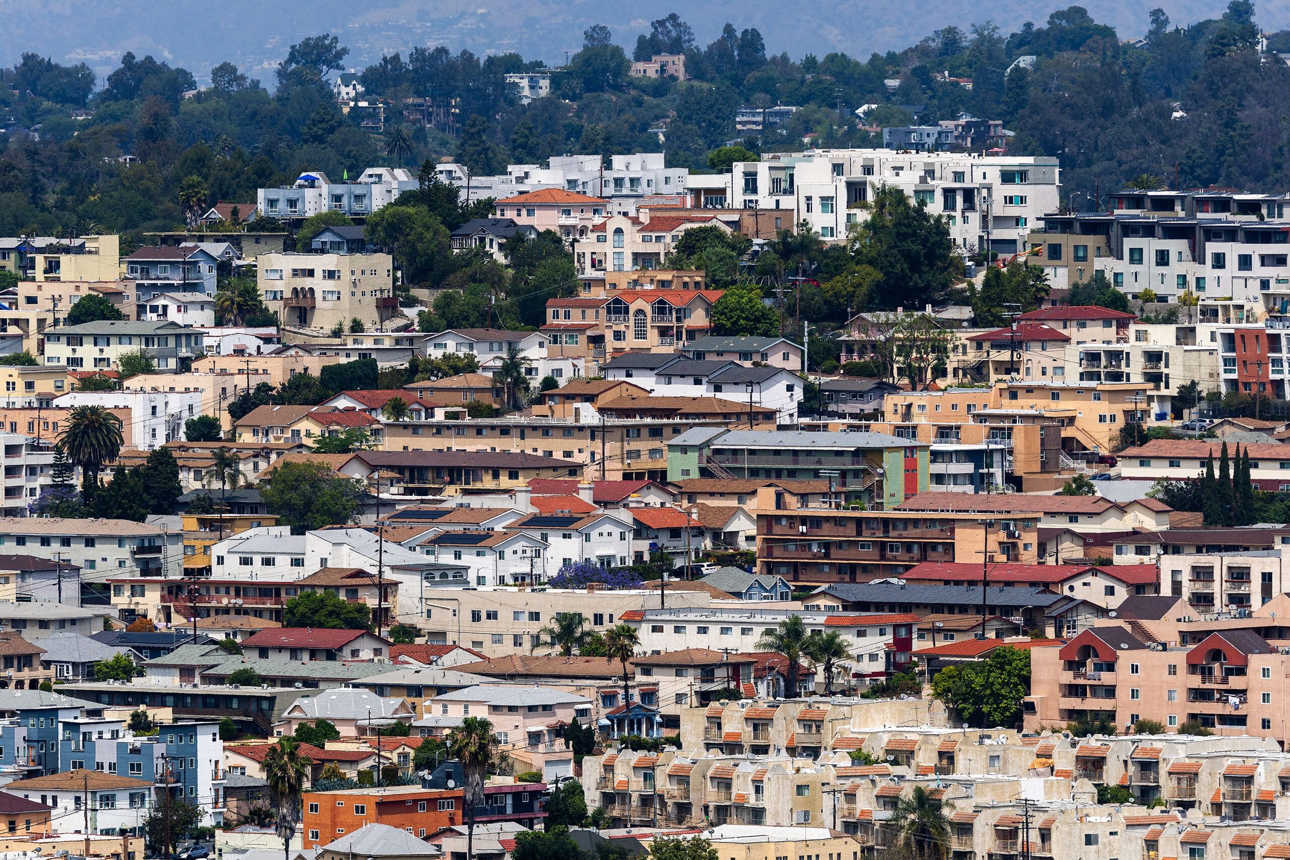 <i>Allen J. Schaben/Los Angeles Times/Getty Images via CNN Newsource</i><br/>An aerial view of homes and apartments in Los Angeles on April 9.