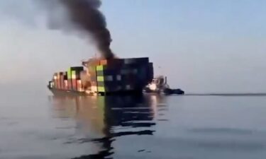 A satellite image shows floating containers and an oil slick in the Strait of Hormuz after the GFS Pride sank.