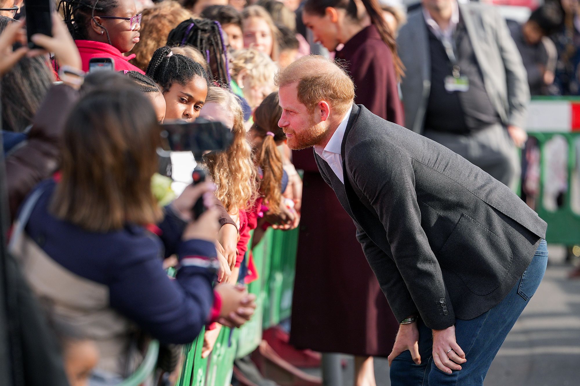 <i>Christopher Furlong/Getty Images via CNN Newsource</i><br/>Prince Harry greets well-wishers who gathered in Nottingham.