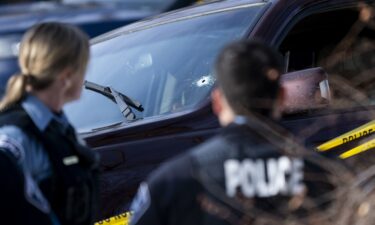A bullet hole is seen in the windshield of Renee Good's vehicle after it crashed and came to a stop in Minneapolis on January 7.