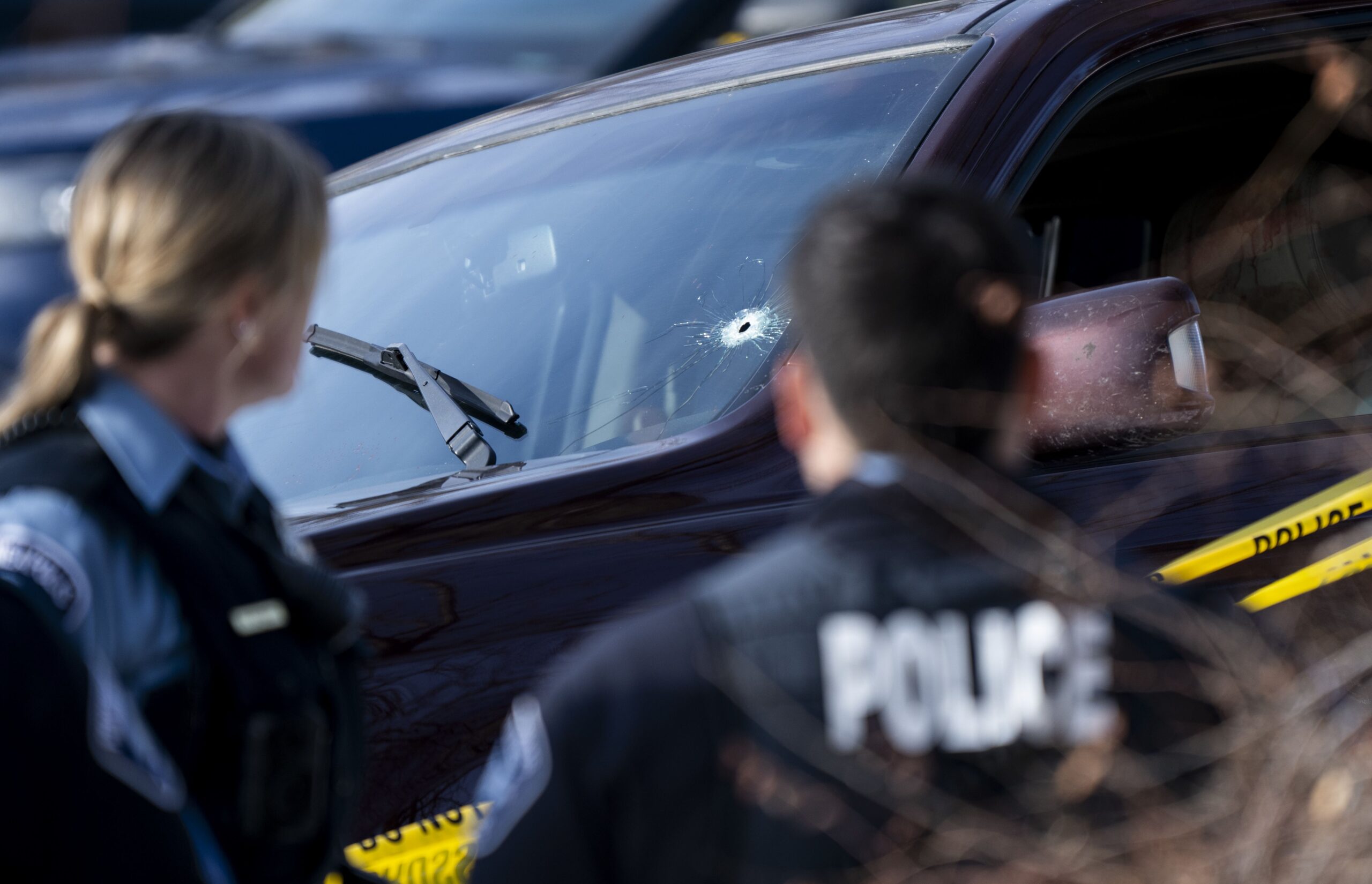 <i>Stephen Maturen/Getty Images via CNN Newsource</i><br/>A bullet hole is seen in the windshield of Renee Good's vehicle after it crashed and came to a stop in Minneapolis on January 7.