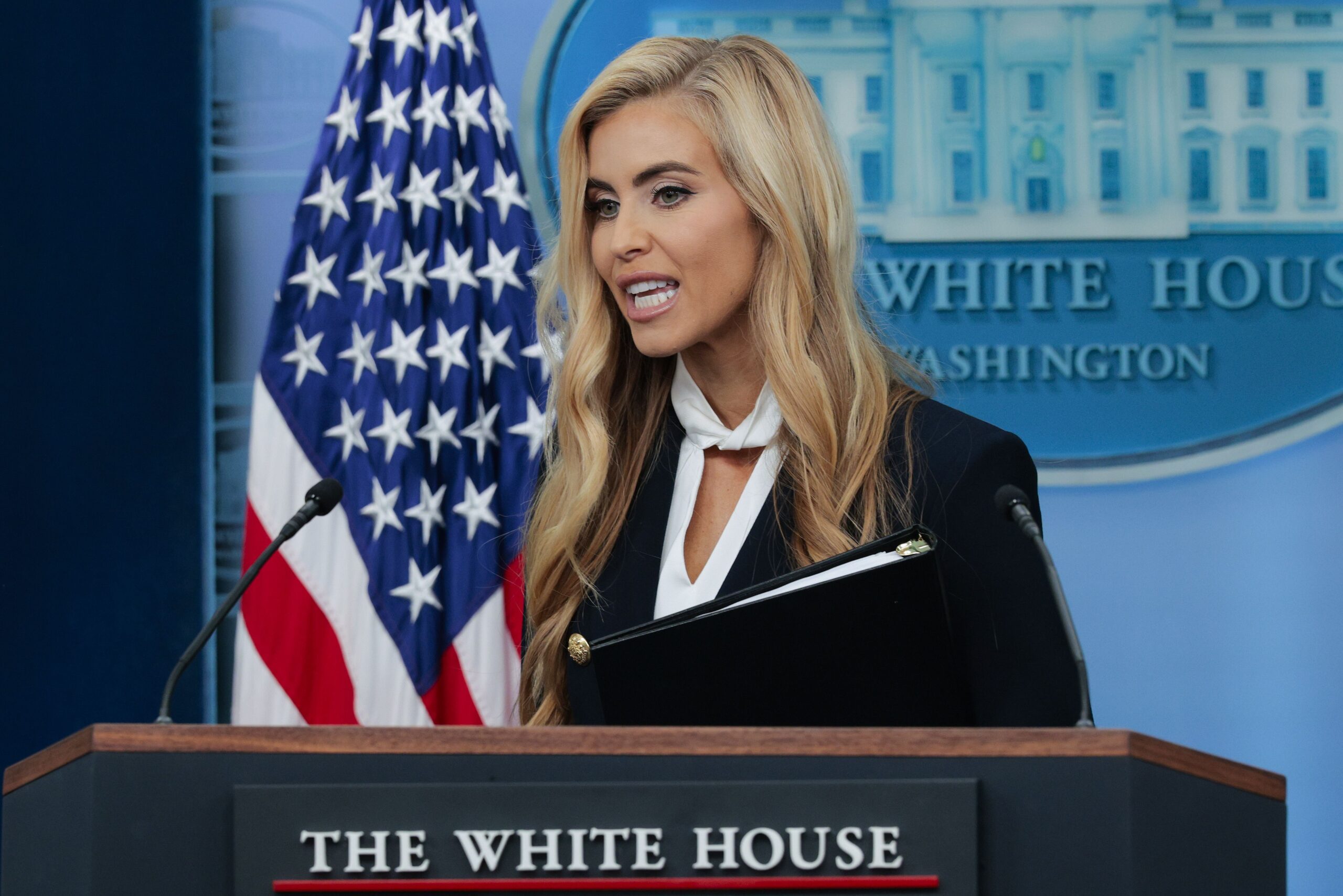 <i>Chip Somodevilla/Getty Images via CNN Newsource</i><br/>White House Press Secretary Katie Zacharia departs following a news briefing on October 13.