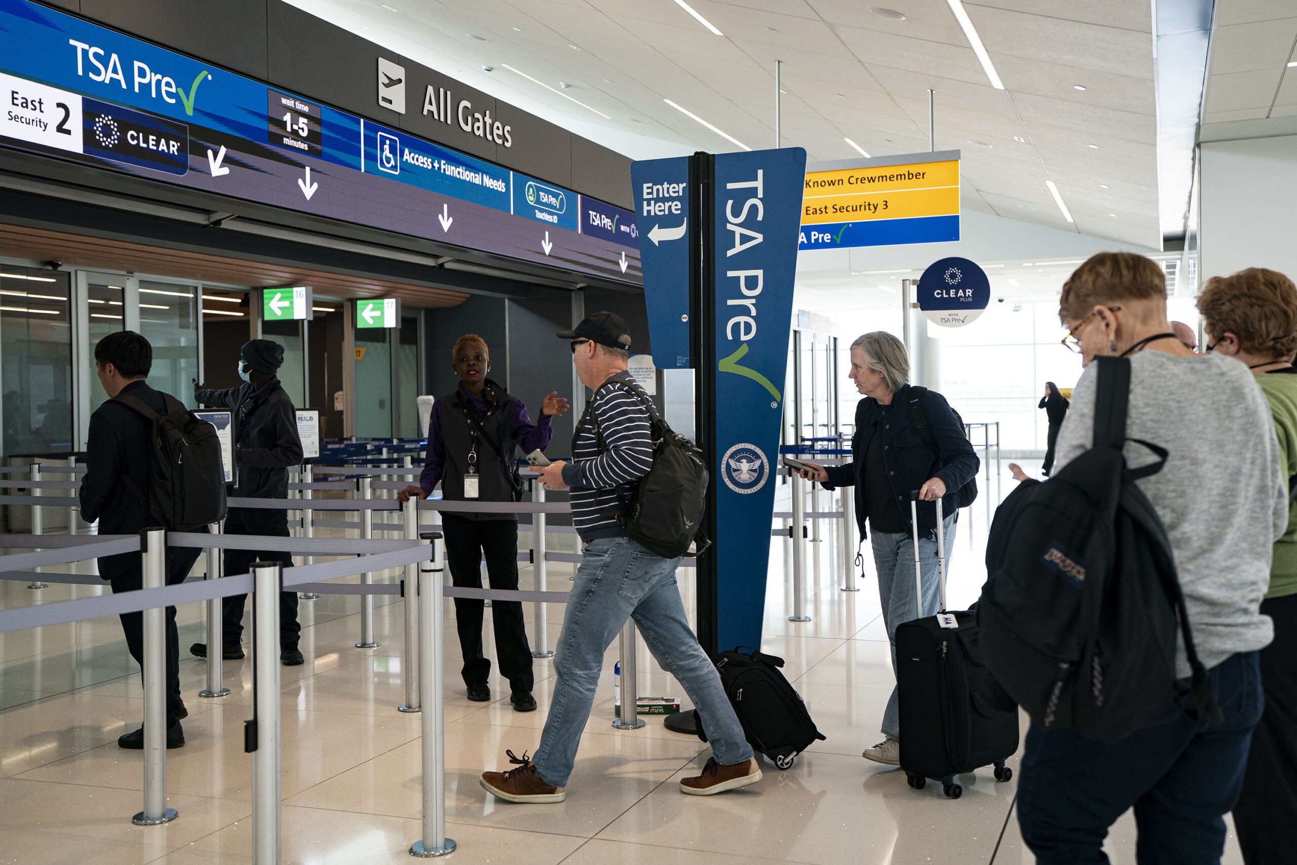 <i>Al Drago/Getty Images/File via CNN Newsource</i><br/>Travelers arrive at the Transportation Security Administration TSA Precheck security line at Denver International Airport (DEN) in Denver