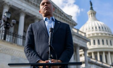 House Minority Leader Hakeem Jeffries speaks to the press on the steps of the US Capitol on September 30.
