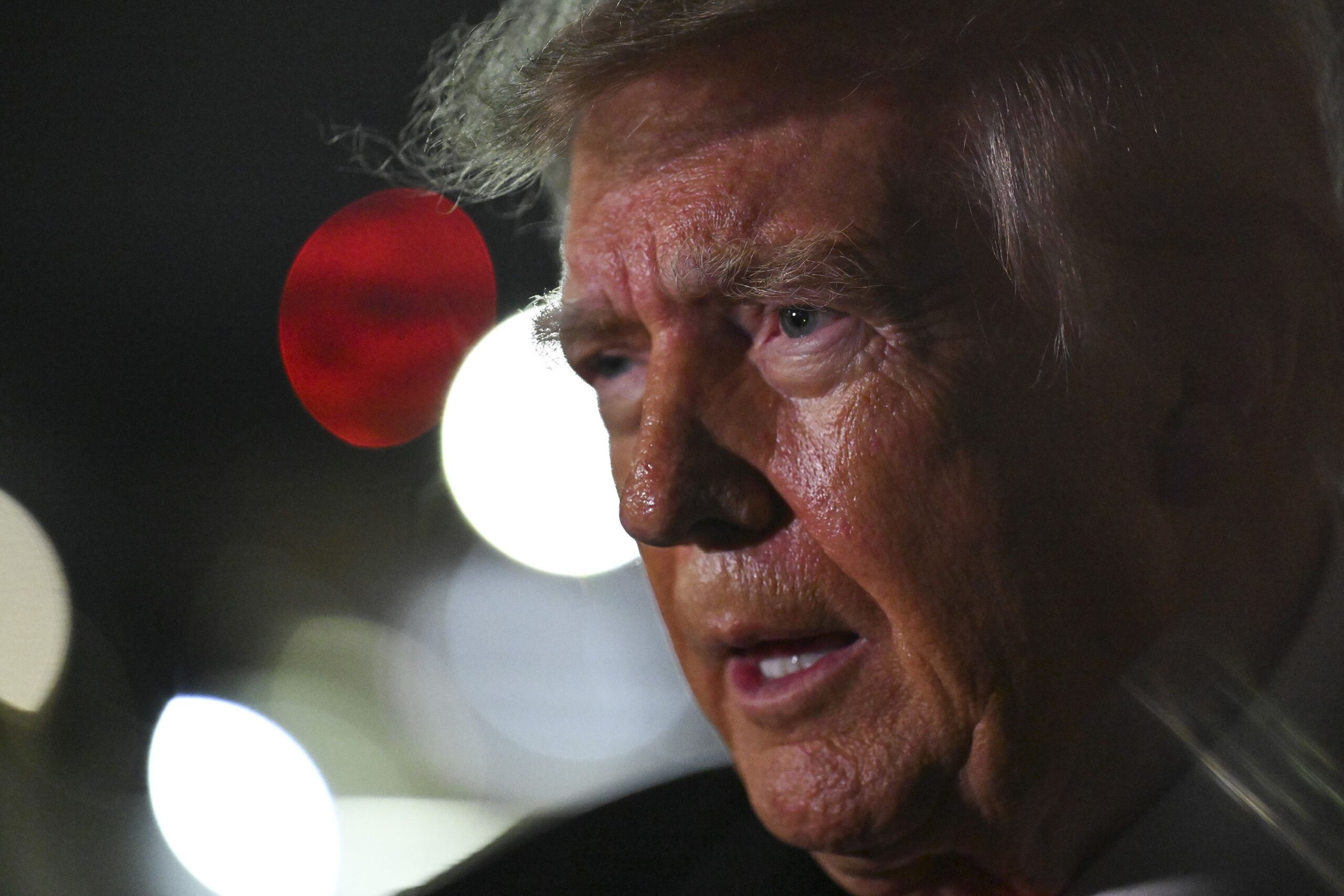 <i>Roberto Schmidt/Getty Images via CNN Newsource</i><br/>US President Donald Trump speaks to members of the press after landing on October 10 at Joint Base Andrews