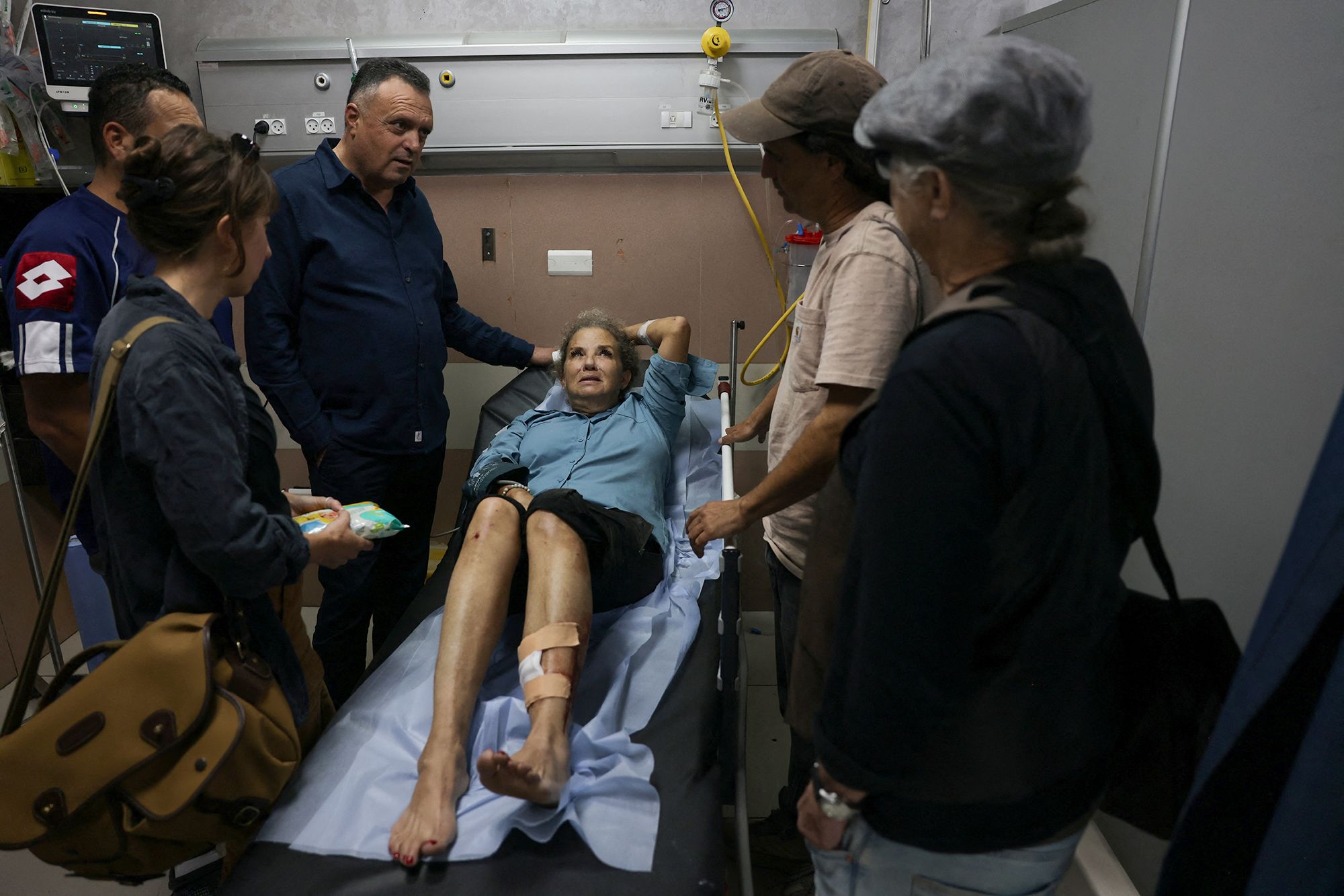 <i>Ahmad Gharabli/AFP/Getty Images via CNN Newsource</i><br/>American photojournalist Heidi Levine lies on a gurney in the emergency room of the government hospital in the Israeli-occupied city of Ramallah