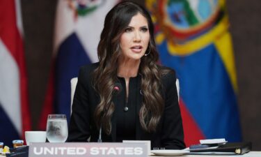 Kristi Noem delivers remarks during a working lunch at the "Shield of the Americas" Summit at Trump National Doral in Miami