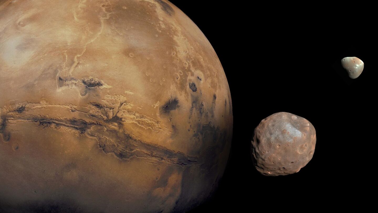<i>JAXA via CNN Newsource</i><br/>An illustration depicts the MMX spacecraft observing Phobos.