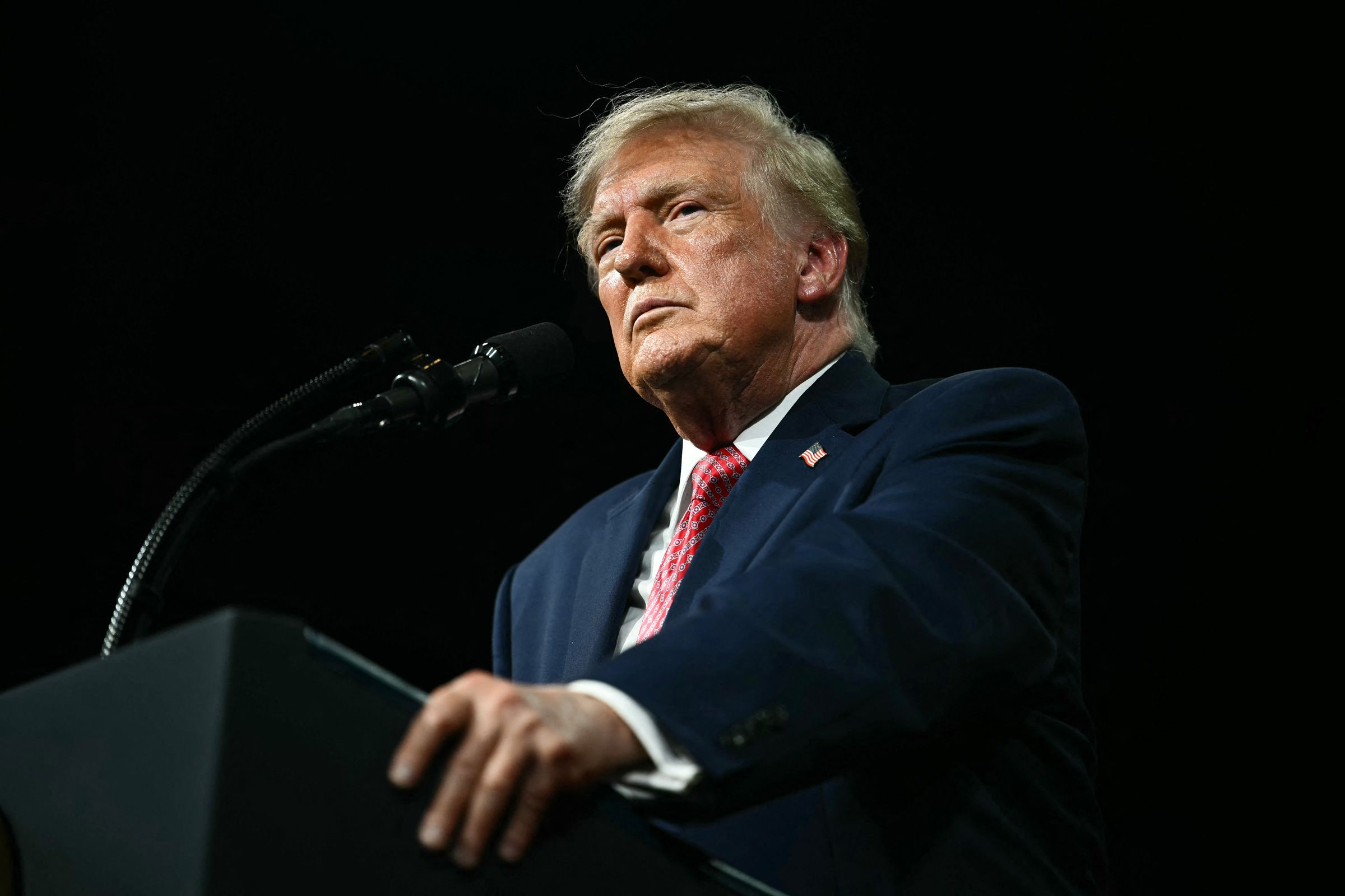 <i>Kent Nishimura/AFP/Getty Images via CNN Newsource</i><br/>US President Donald Trump speaks during a campaign rally at the Heartland Credit Union Arena in Park City