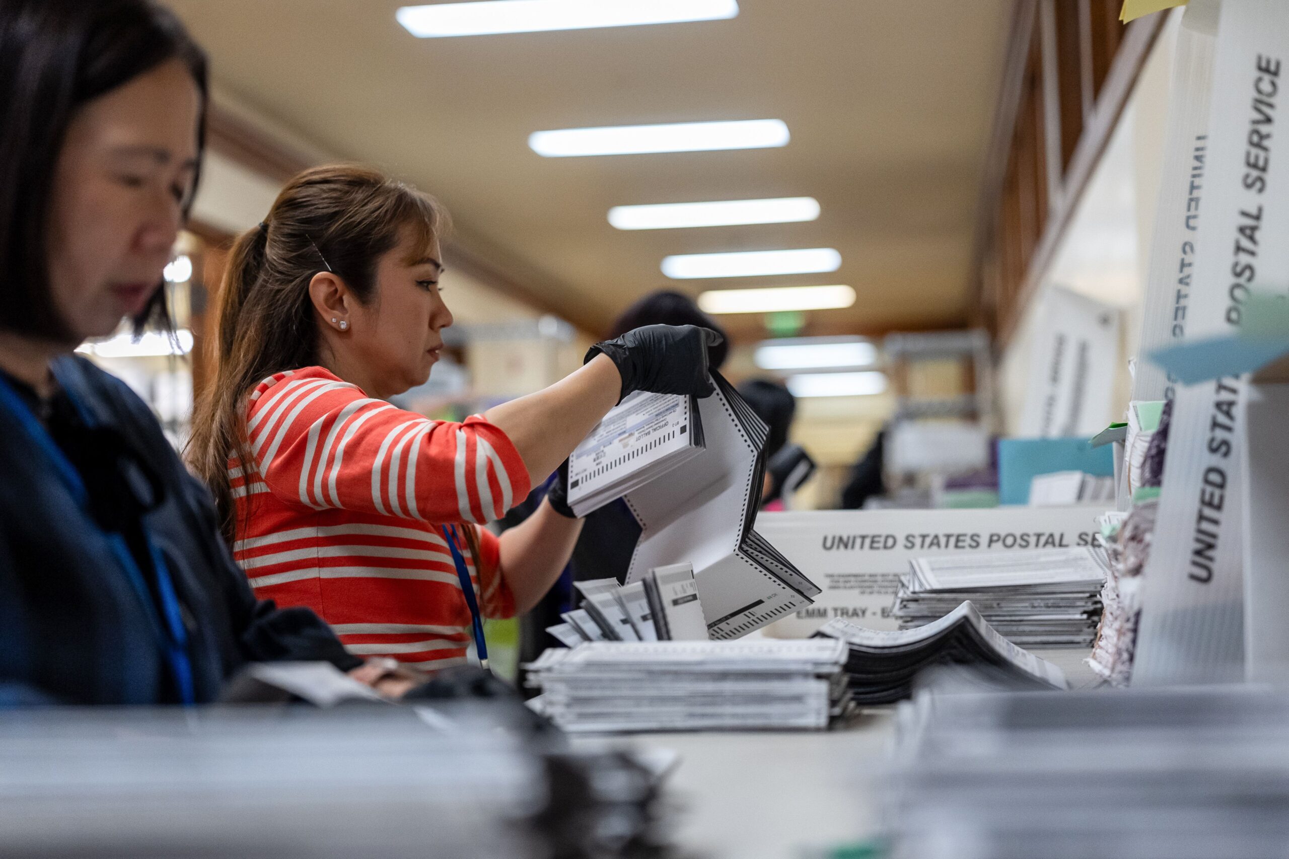 <i>David Paul Morris/Bloomberg/Getty Images via CNN Newsource</i><br/>Election workers sort ballots during early voting ahead of the midterm election at San Francisco County's election operations facility at City Hall in San Francisco