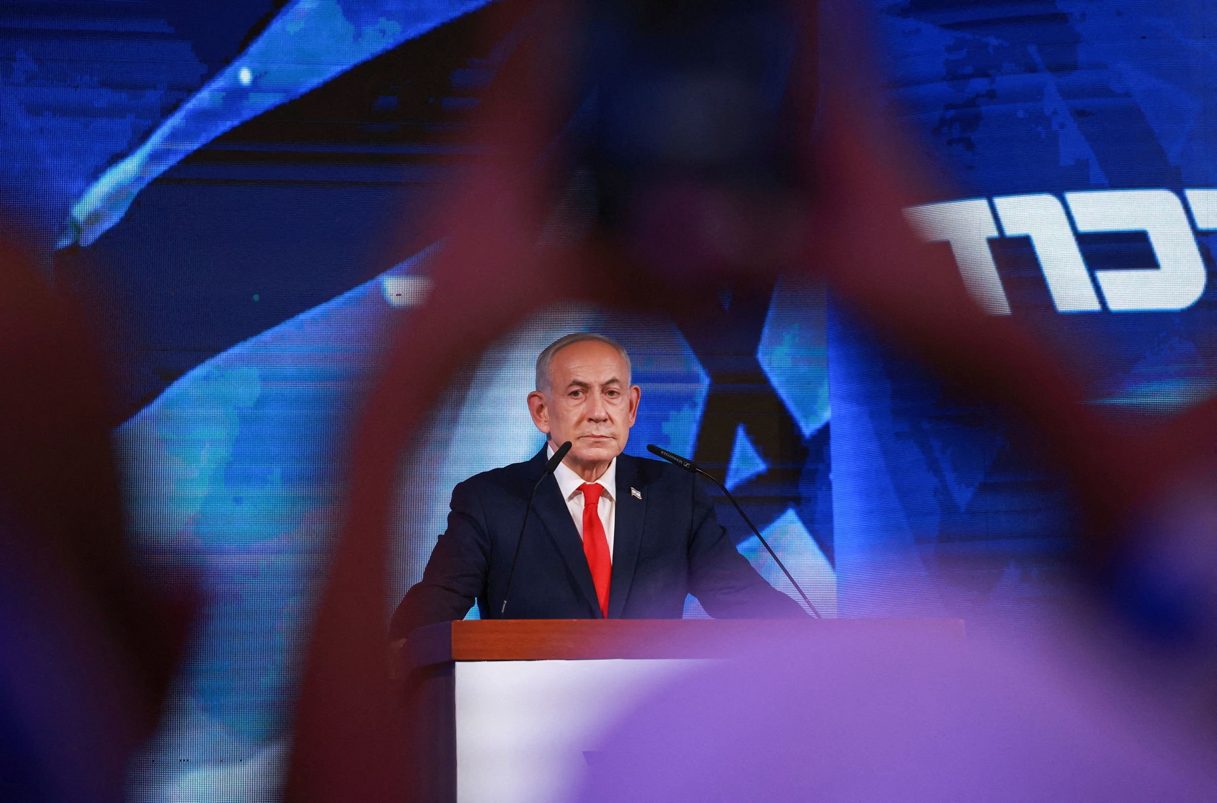 <i>Ronen Zvulun/Reuters via CNN Newsource</i><br/>Israeli Prime Minister and Likud party leader Benjamin Netanyahu reacts to exit polls
