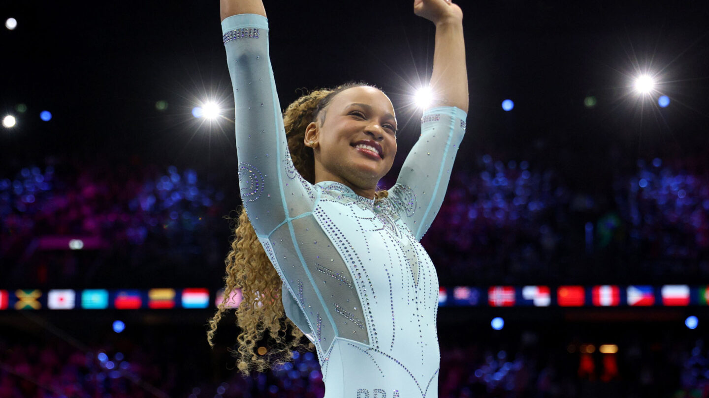 <i>NBC Olympics</i><br/>Rebeca Andrade waves and celebrates