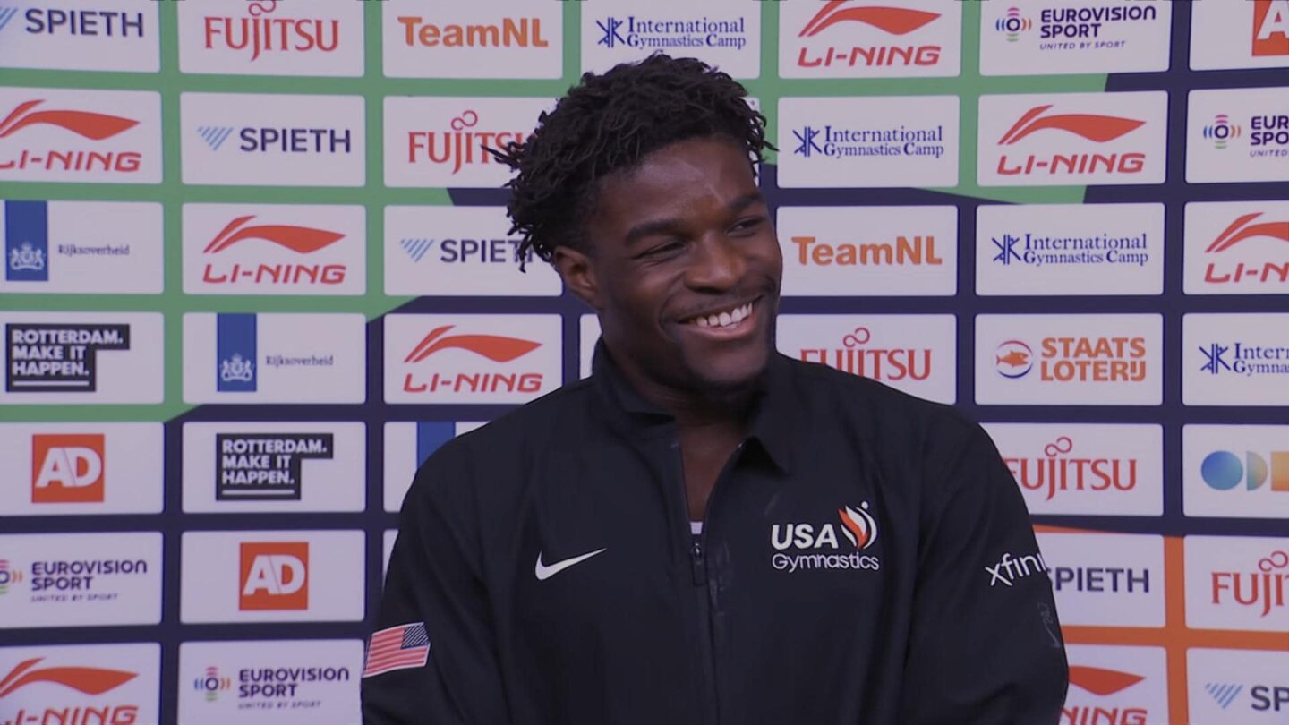 <i>NBC Olympics</i><br/>Frederick Richard stands in front of a step-and-repeat during an interview