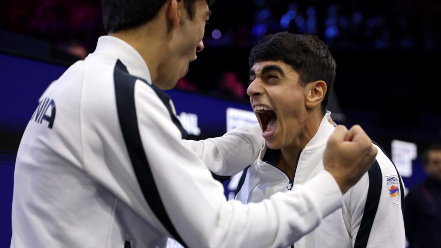 <i>NBC Olympics</i><br/>Hamlet Manukyan lets out an elated scream in front of a teammate