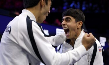 Hamlet Manukyan lets out an elated scream in front of a teammate