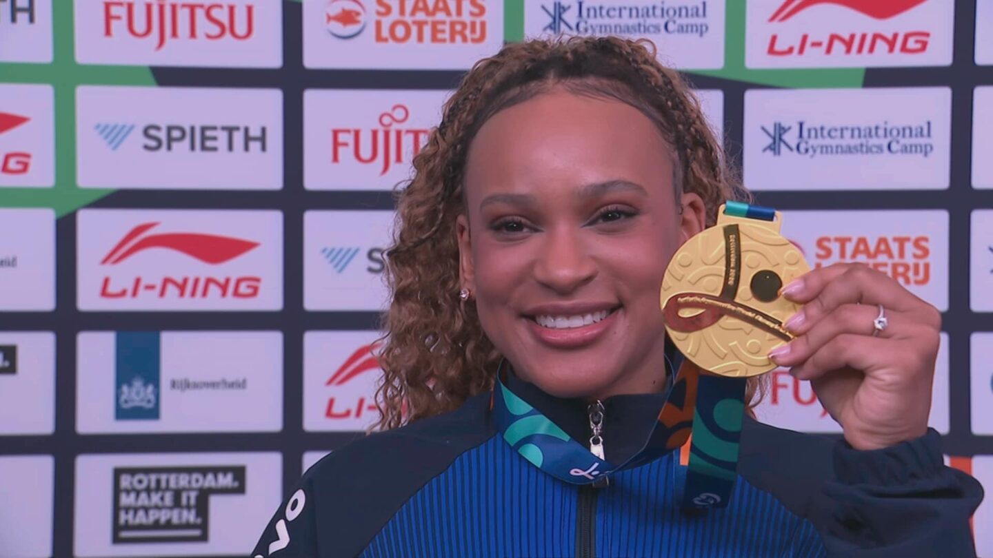 <i>NBC Olympics</i><br/>Rebeca Andrade holds up gold medal at 2026 World Championships