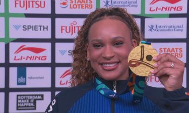 Rebeca Andrade holds up gold medal at 2026 World Championships