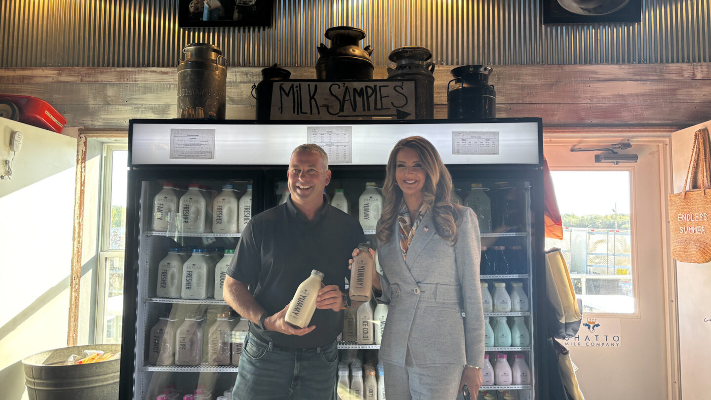 Matt Shatto and Kelly Loeffler posing with Shatto milk product.